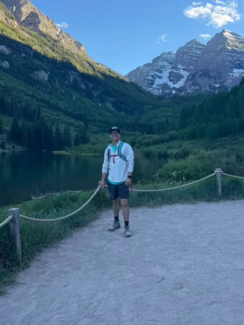 Alex Olson at Maroon Lake, below the Maroon Bells in Colorado